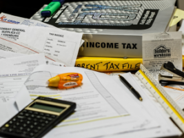 When does a non-Polish citizen working in Poland have to start paying taxes?